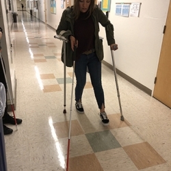 Practicing adapted mobility with crutches